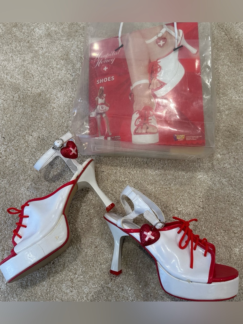 “Hospital Honey” platform heels with first aid/heart charm size 9-10